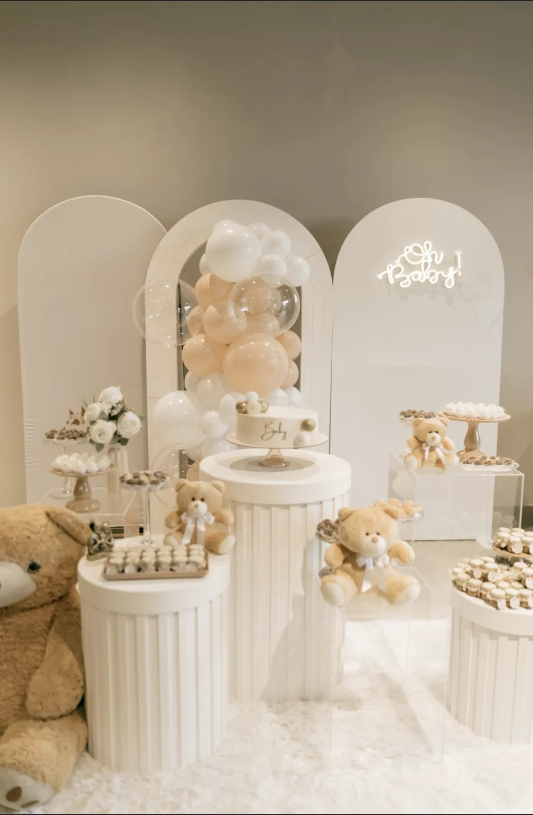 Elegant shower event decor with pastel florals and styled backdrop