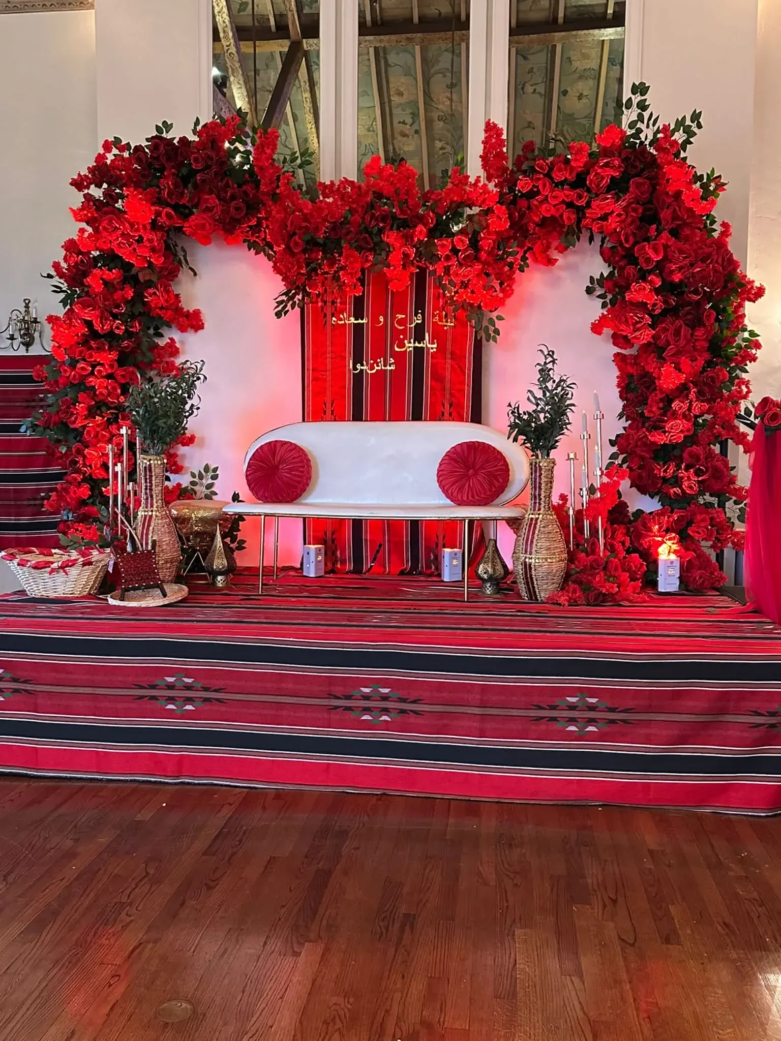 Engagement or henna celebration decor with colorful styling