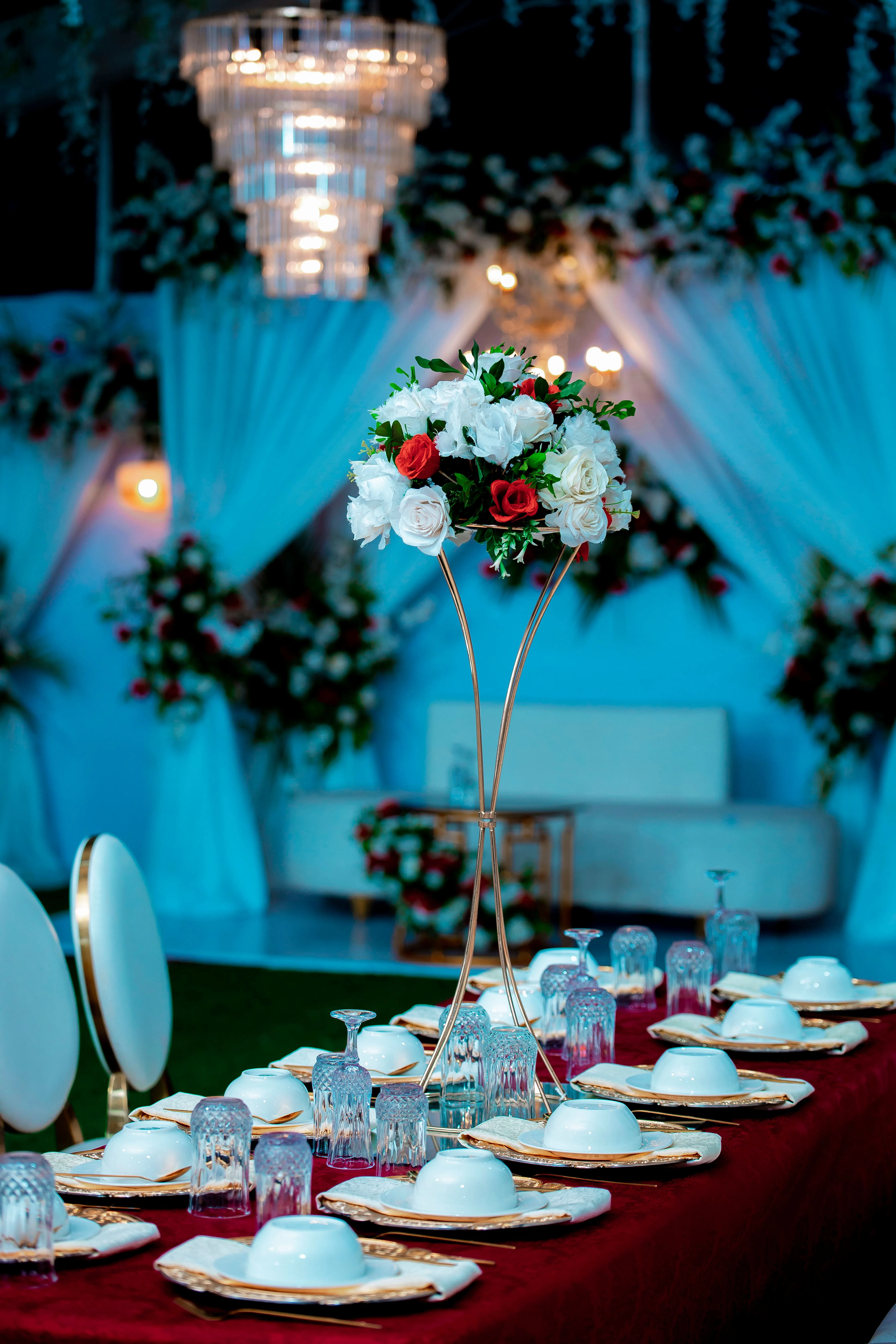 Wedding reception decor with floral stage styling